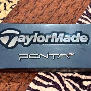 Taylor Made Penta golf balls 
New in box